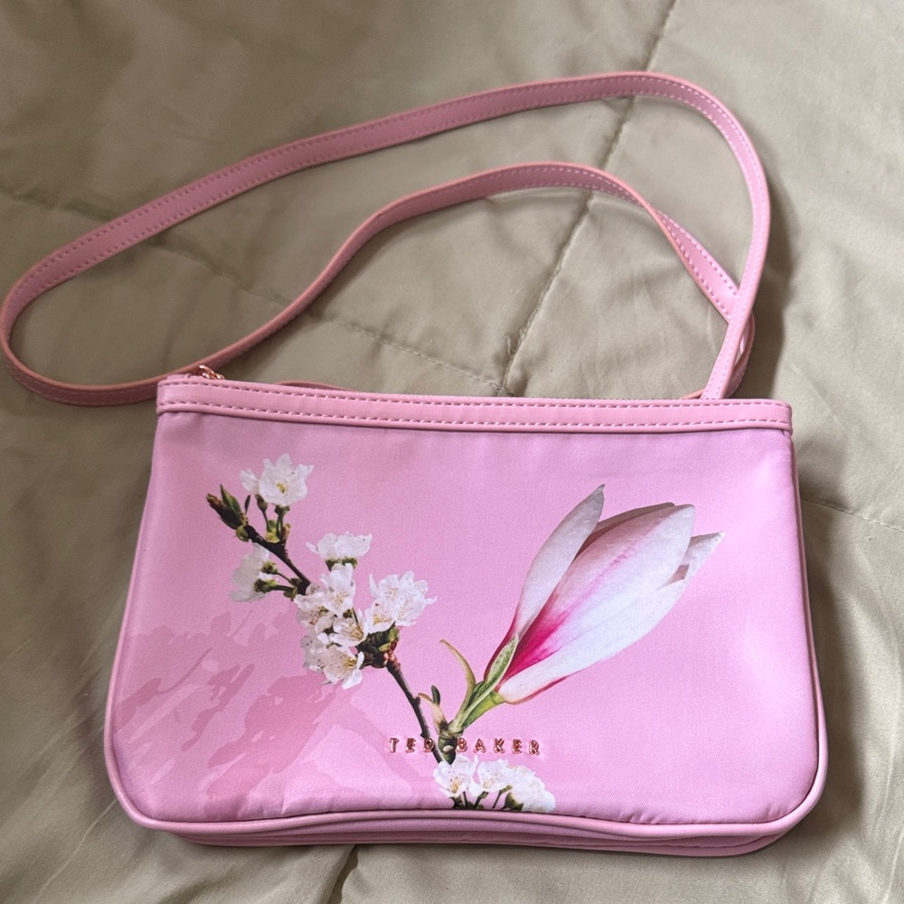 Ted Baker Harmony Floral Crossbody Bag in a pale pink nylon fabric. MSRP $89